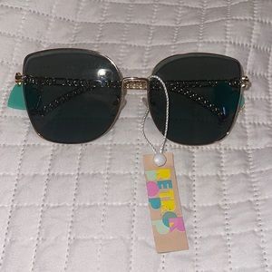 Fashionable sunglasses with blue hearts